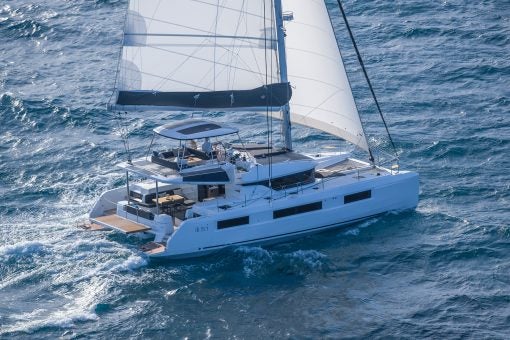 Friends sailing luxury Lagoon 51 yacht