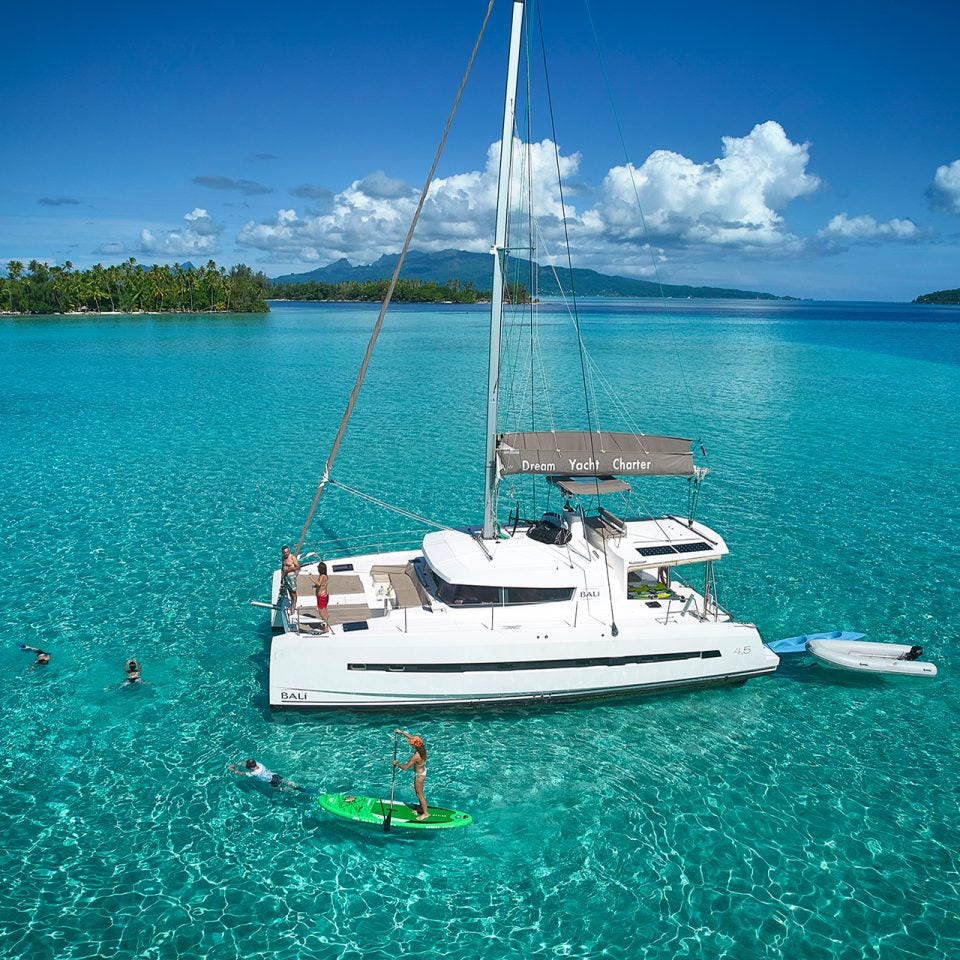 Fractional yacht ownership catamaran anchored in Tahiti