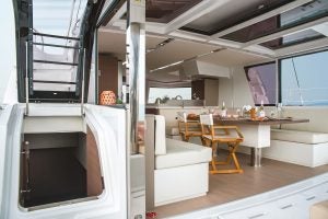 Catamaran Sailboat Bali 4.8 salon interior with entrance to lower deck