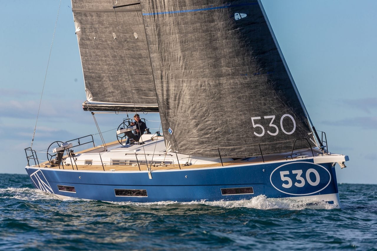 Sailing Yacht Dufour 530 with sailing man at helm