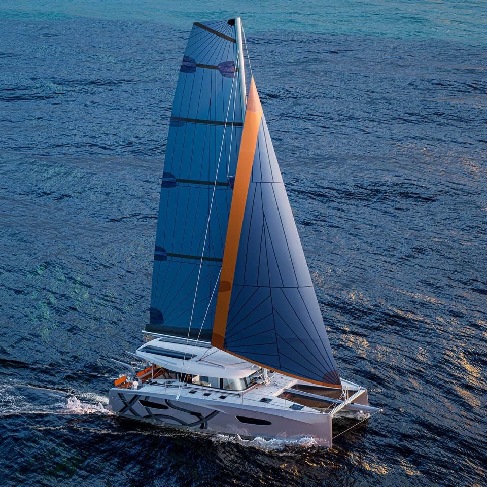 Aerial view of the Excess 13 catamaran sailing