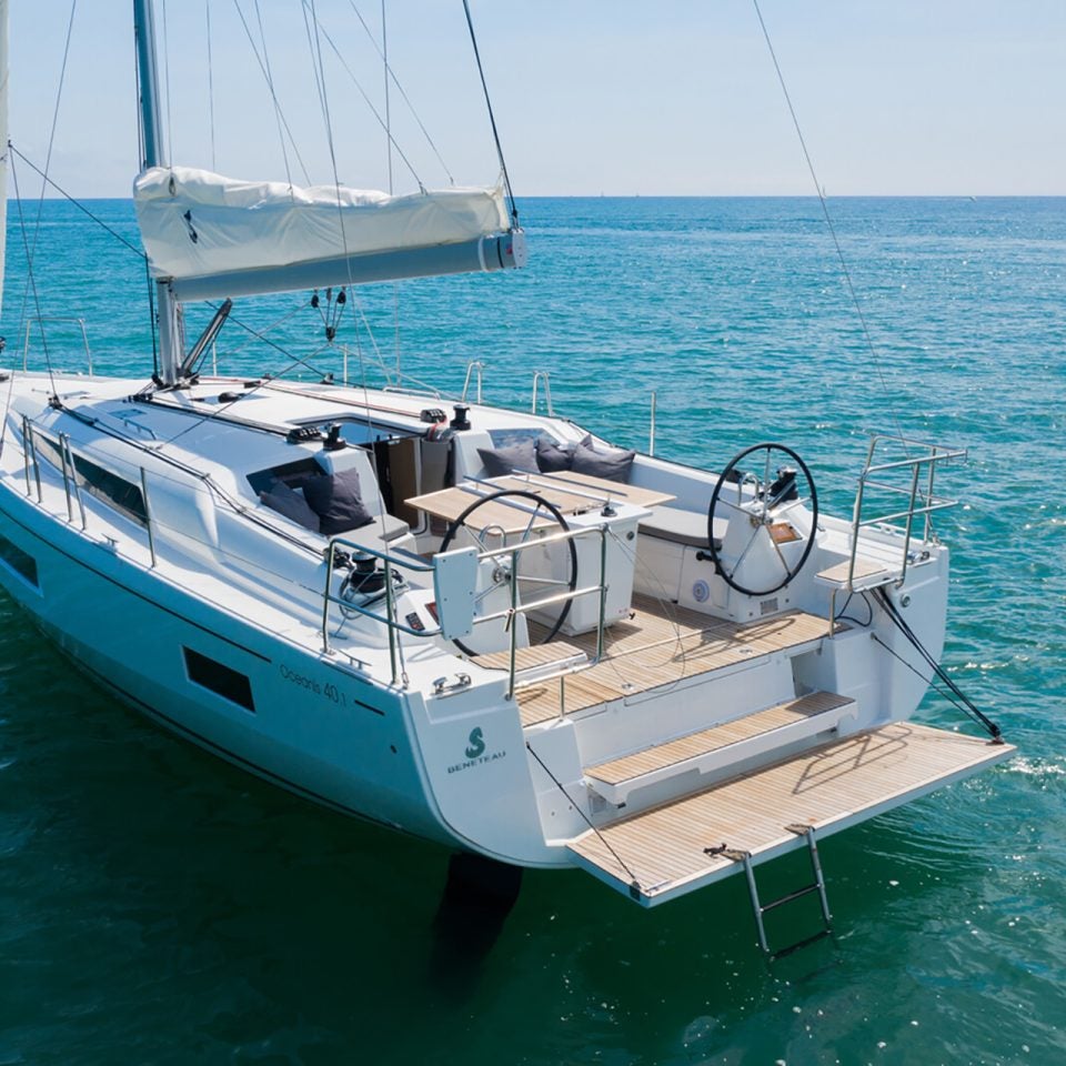 Beneteau 40.1 monohull anchored in clear blue water