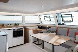 Excess 13 catamaran saloon interior with wraparound windows