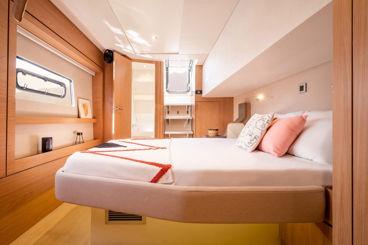 Large light wood cabin with double bed aboard a Bali 4.8 yacht