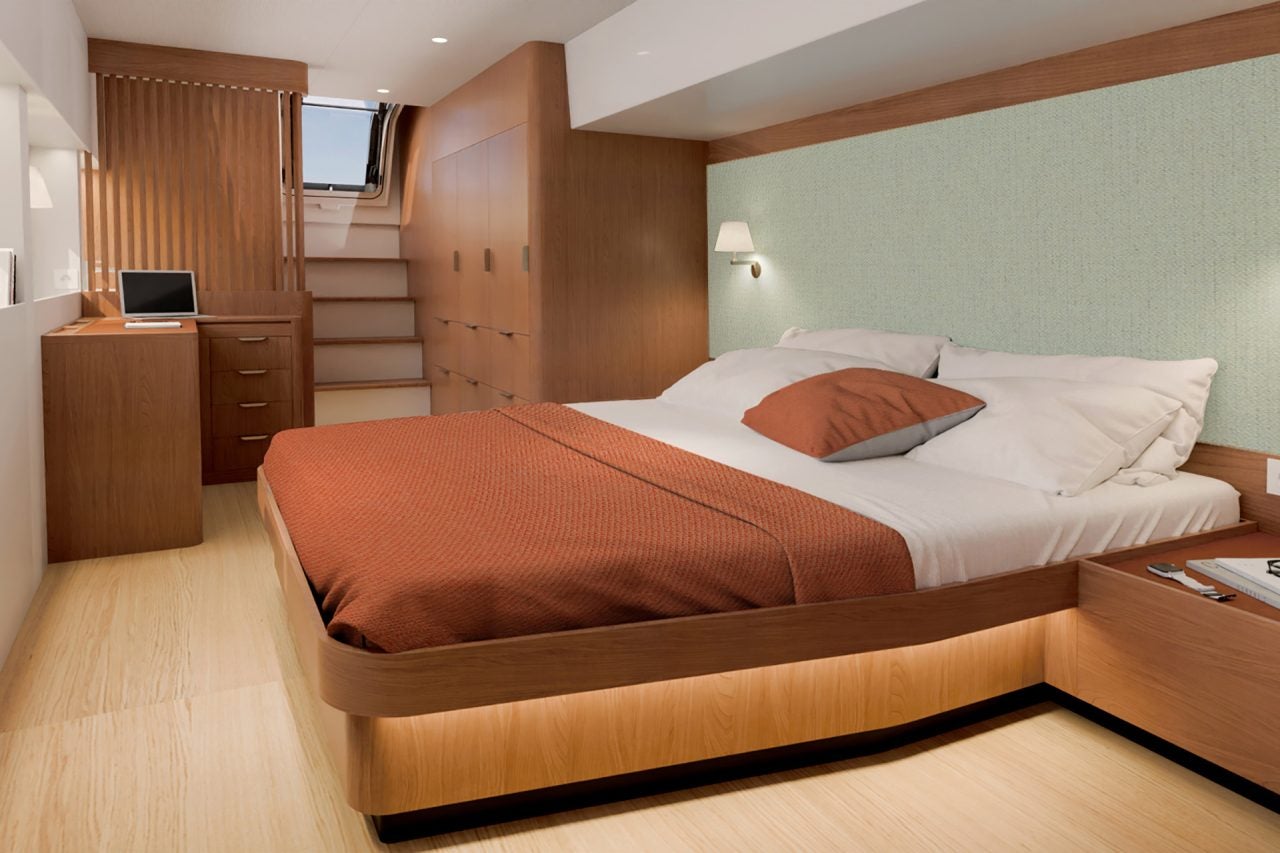 Luxury suite with wood finishes and double bed aboard the Bali 5.8 catamaran