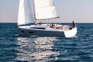 Beneteau 34.1 under sail with man at helm