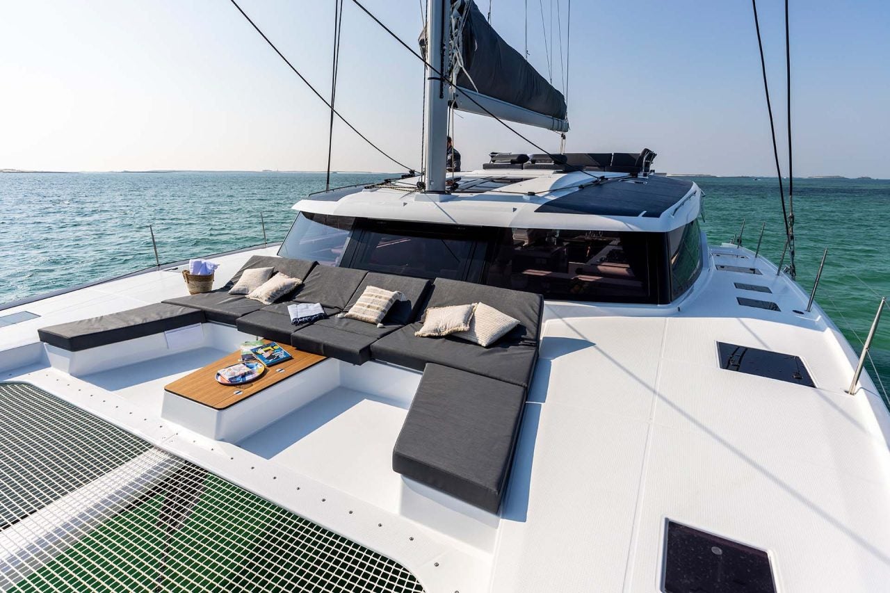 Comfortable lounge area on foredeck of the Fountaine Pajot Aura 51 electric catamaran