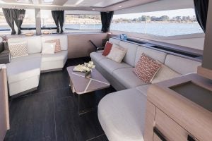 Interior lounge seating on the Fountaine Pajot Aura 51 electric catamaran