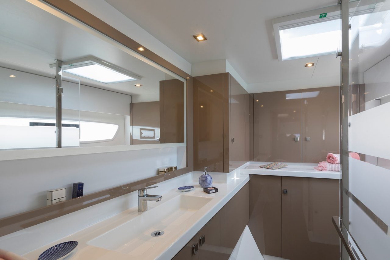 Owners suite bathroom aboard the Astrea 42 smart electric catamaran