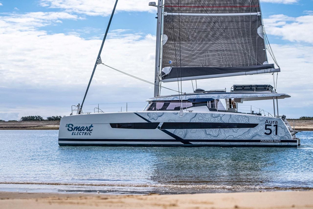 Side view of the Fountaine Pajot Aura 51 catamaran at sail