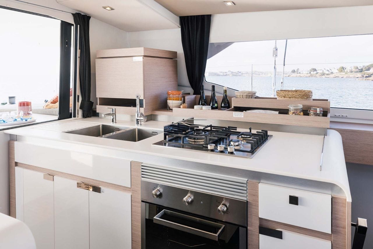 Fountaine Pajot Aura 51 electric catamaran sink and stovetop