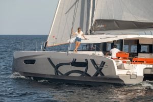 Excess 14 catamaran sailing with a couple on board