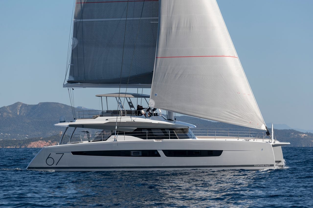 Alegria 67 catamaran cruising with sails up