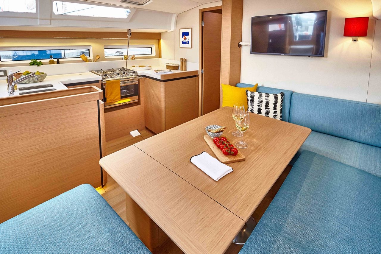 Sun Odyssey 490 sailboat galley and dining area