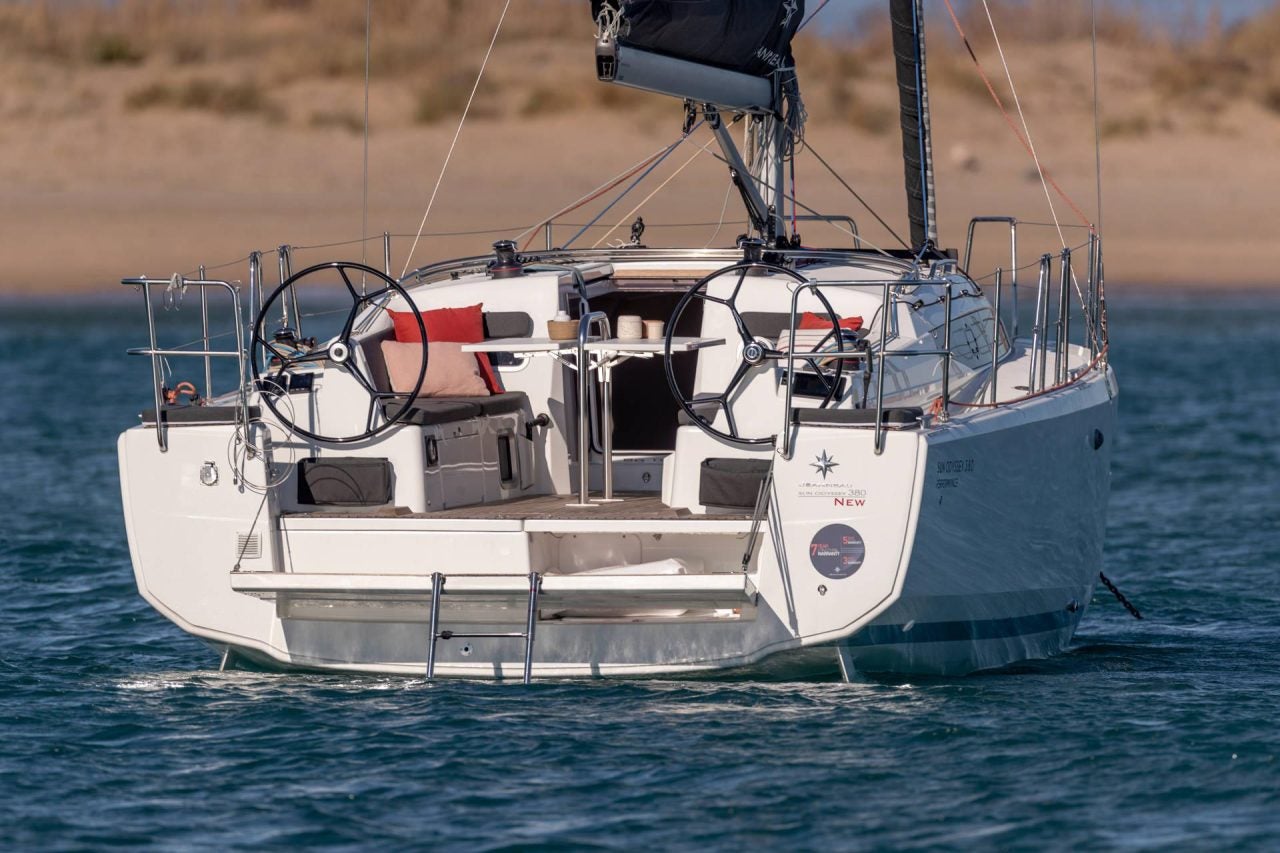 Stern view of the Sun Odyssey 380 sailboat at anchor